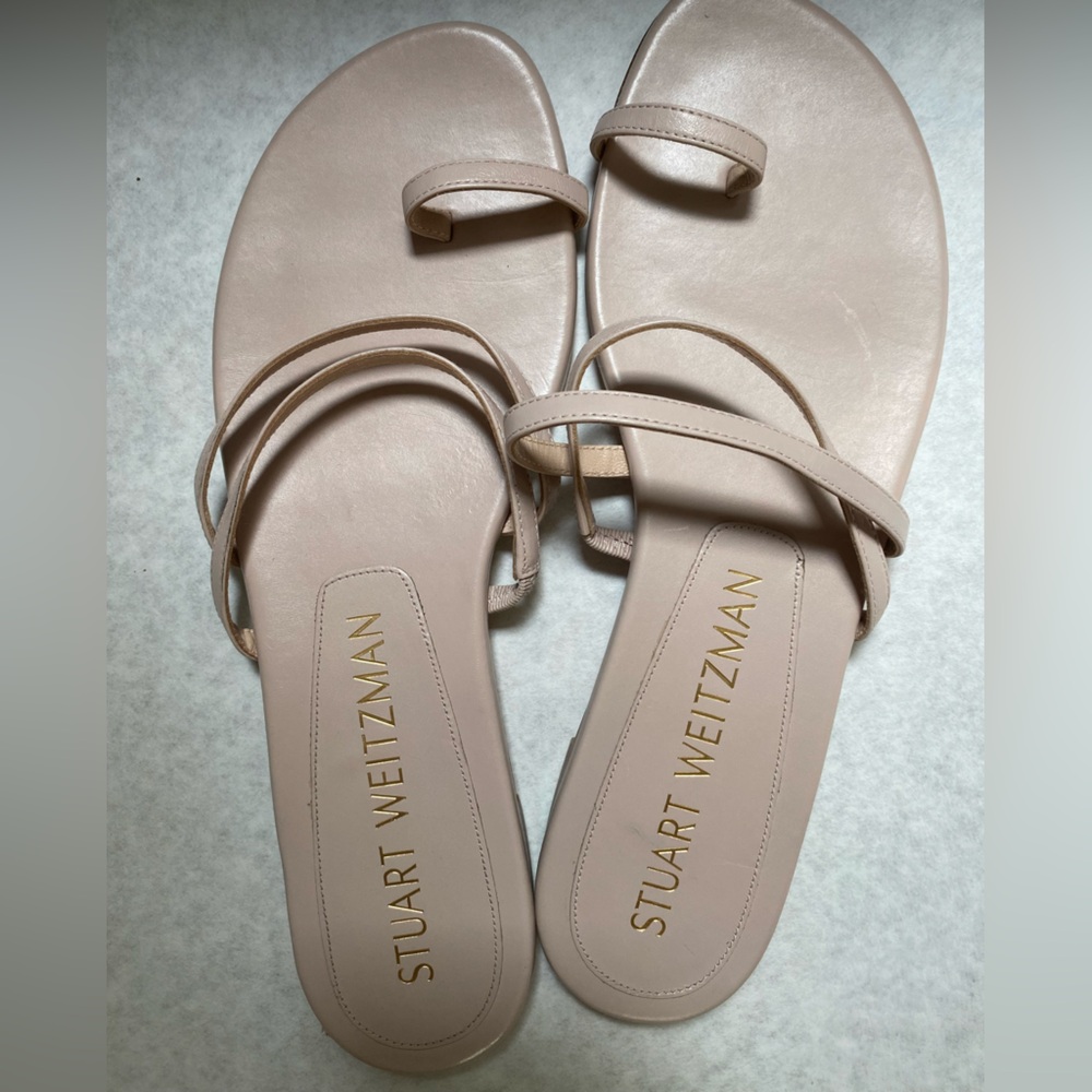 Stuart Weitzman tan Leonita slide sandal.
